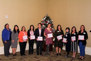 2018 Komen OC grant recipients. From L to R: Komen’s Director of Mission Services Ambrocia Lopez; Komen Board member Dr. January Lopez; YMCA of North Orange County Past President Rosamaria Gomez-Amaro; Vietnamese American Cancer Foundation Executive Director Becky Nguyen; The Cambodian Family Community Center Executive Director Vattana Peong; Share Ourselves Nurse Clinic Manager Kristin Almieri; Planned Parenthood of Orange and San Bernardino Counties Vice President of Development Laurie Rayner; Nhan Hoa Comprehensive Health Care Clinic Boardmember Duc Vuong; AltaMed Health Services Nurse Practitioner Deborah Binning; and at Breast Cancer Solutions Executive Director Jennifer Anderson.